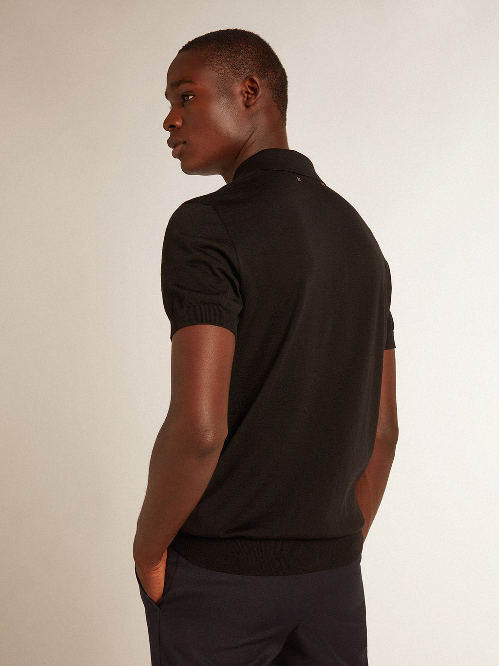 Men's short-sleeved polo shirt in black merino wool| Golden Goose