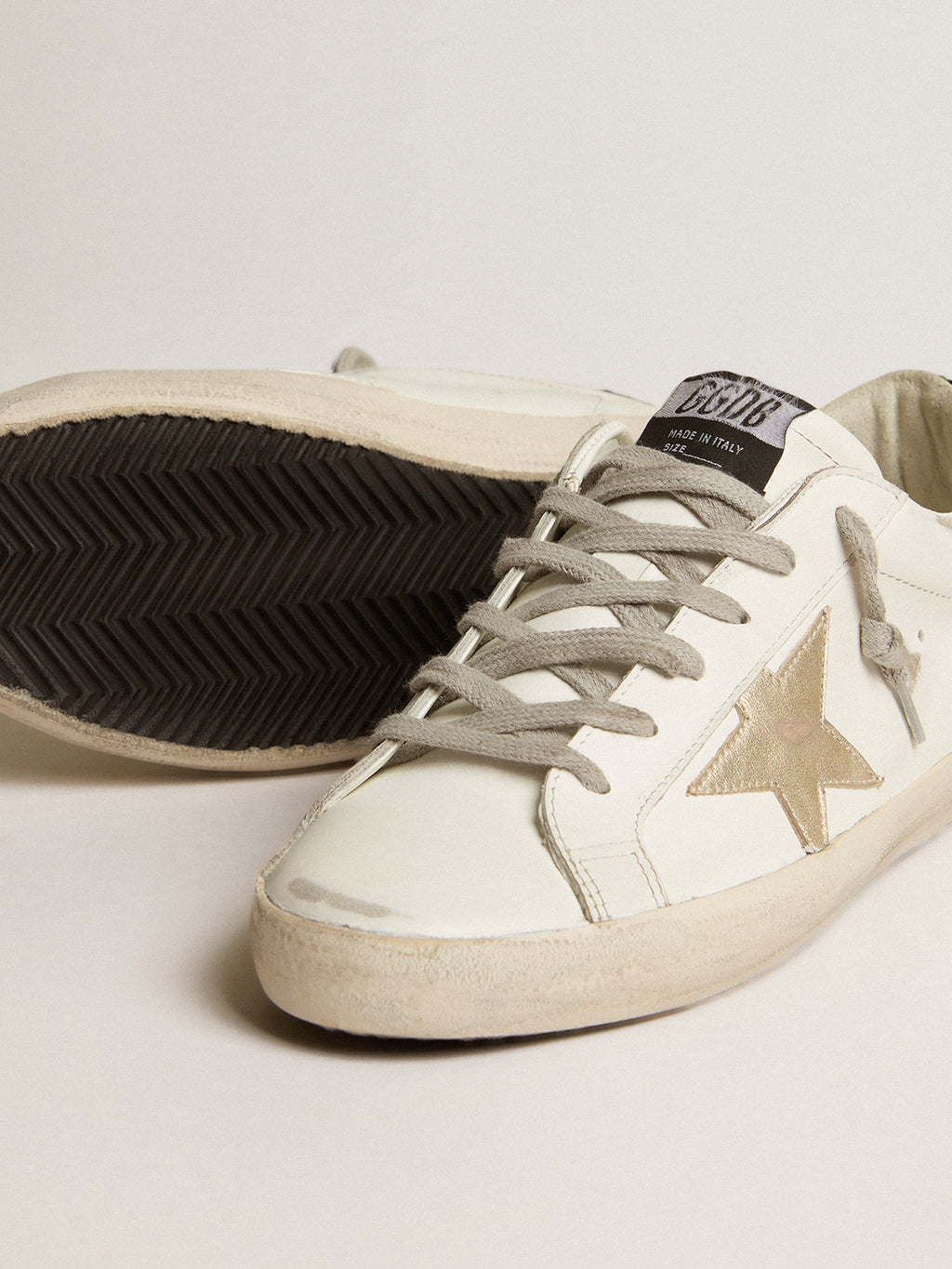 Super-Star with gold star and black glitter heel tab| Golden Goose