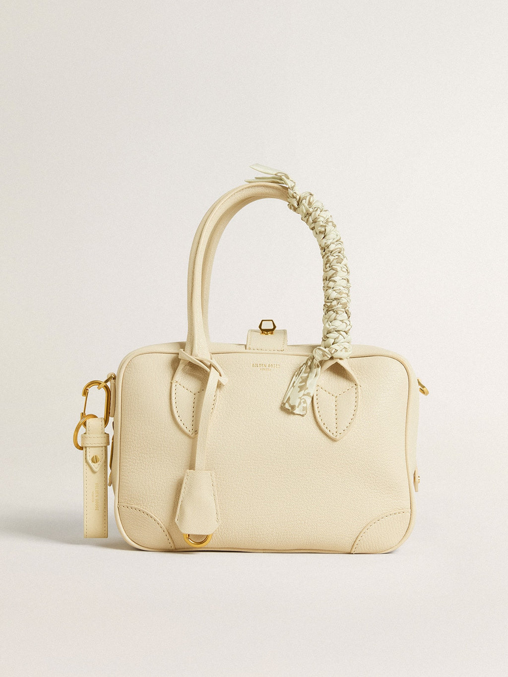 Butter-colored braided fabric charm with brass chain| Golden Goose