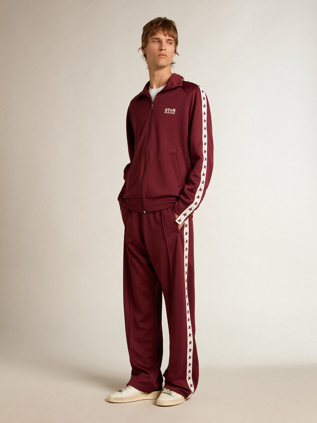 Men's burgundy joggers with stars on the sides| Golden Goose
