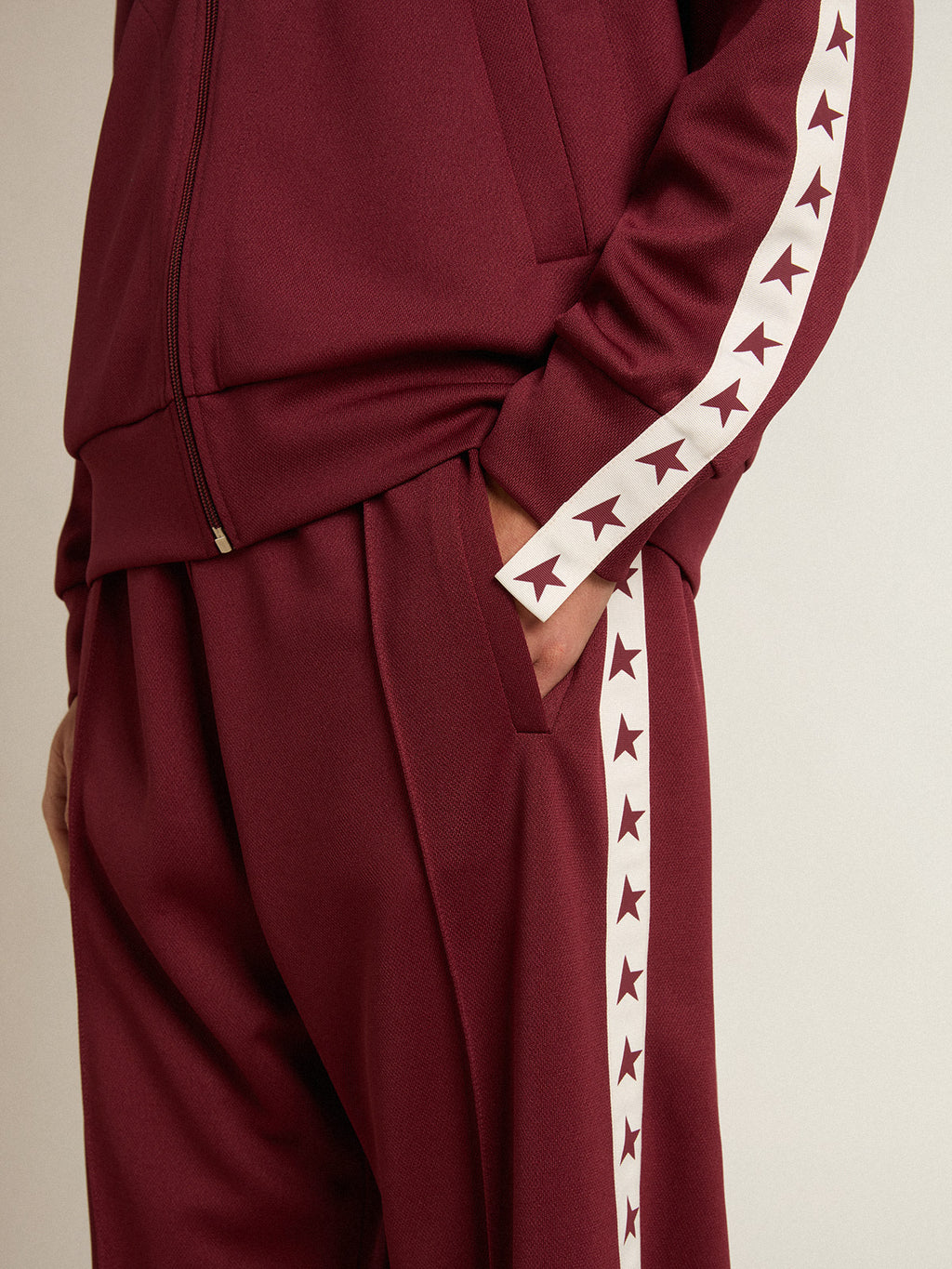 Men's burgundy joggers with stars on the sides| Golden Goose