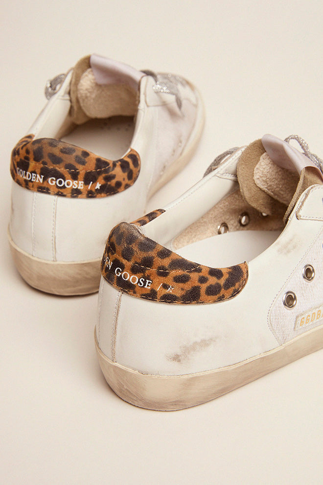 Super-Star in canvas and leather with light blue star and leopard heel tab| Golden Goose