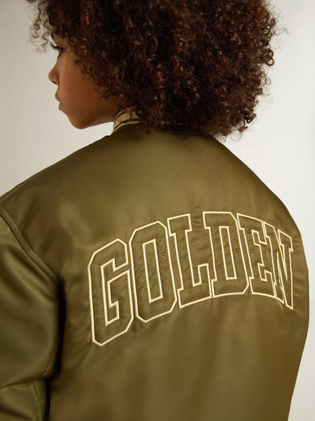 Kids military-green nylon bomber jacket with lettering on the back| Golden Goose