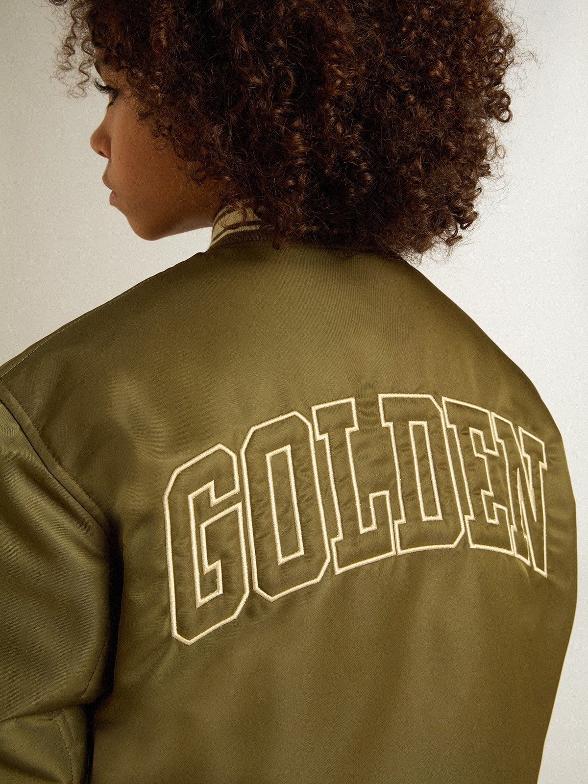 Kids military-green nylon bomber jacket with lettering on the back| Golden Goose