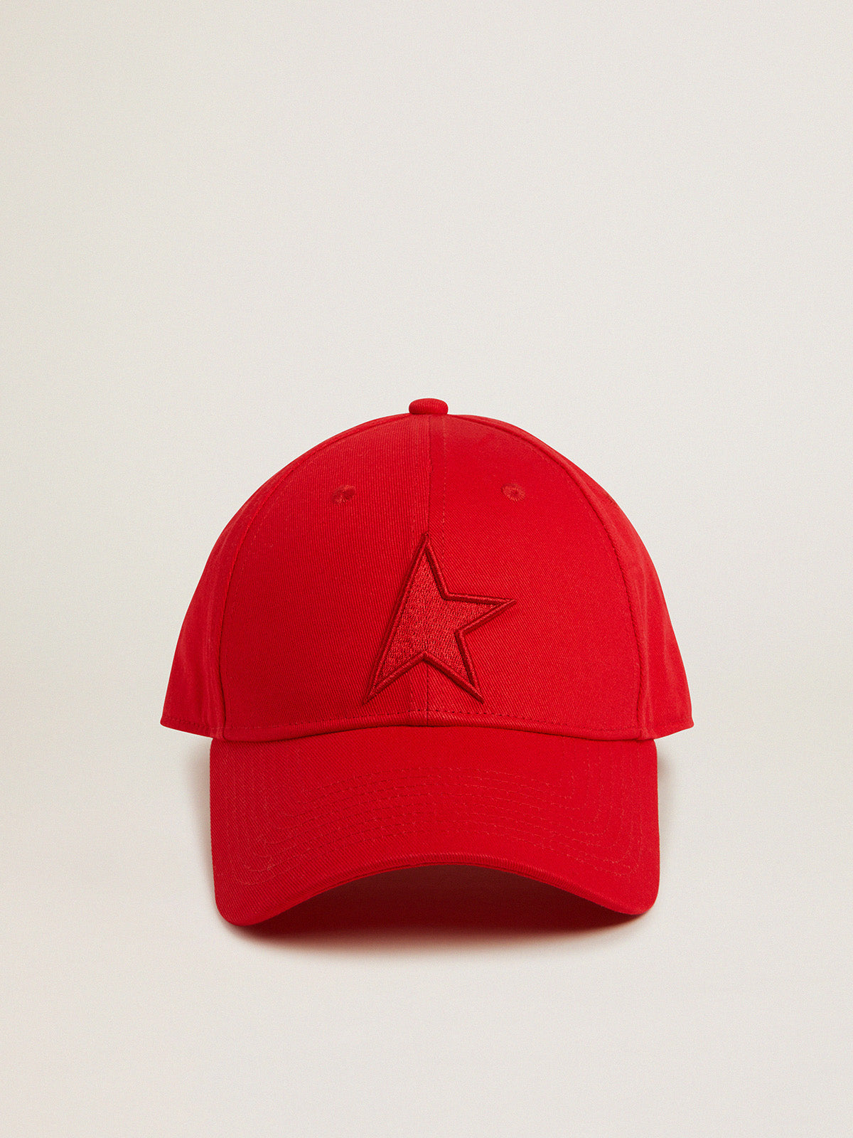 Red cotton baseball cap with tone-on-tone star-shaped patch on the front| Golden Goose