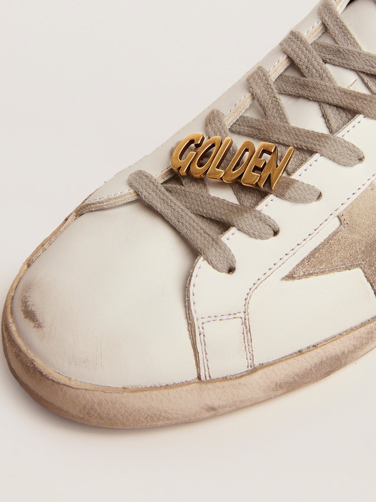 Men's lace lock with clip in old gold color with Golden lettering| Golden Goose