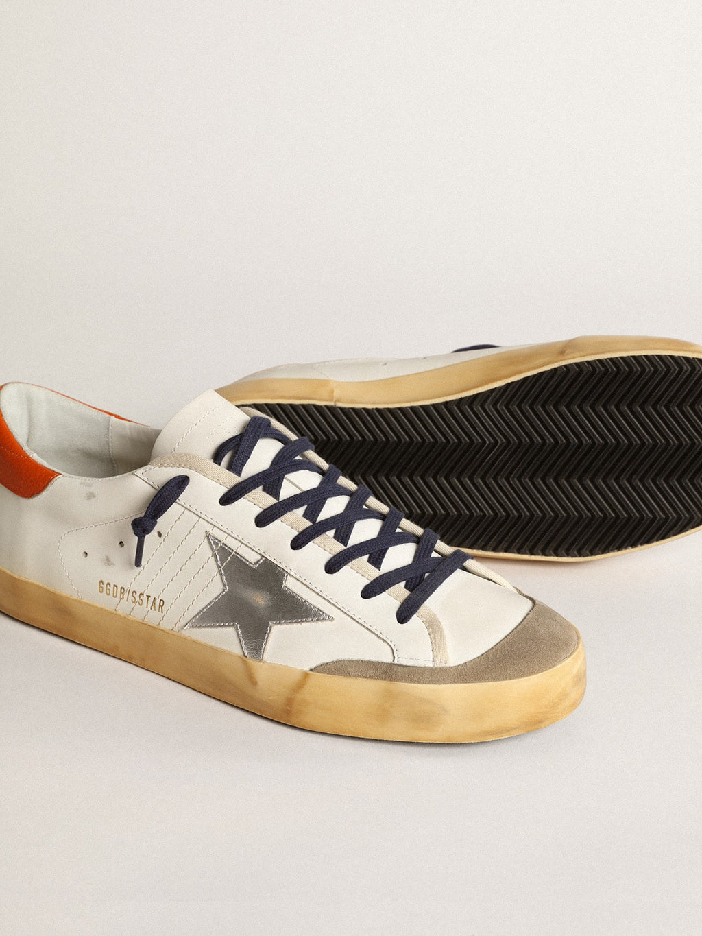 Super-Star Penstar with silver star and orange heel tab| Golden Goose