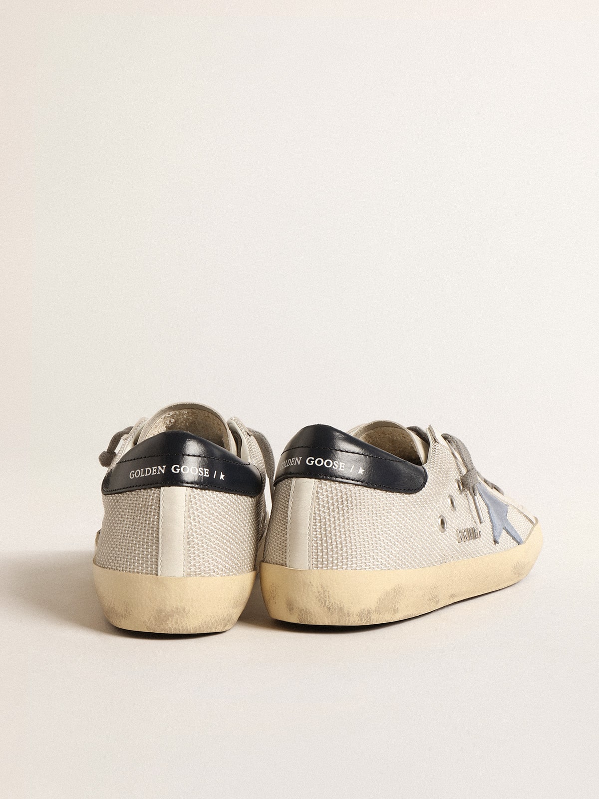 Super-Star in pale silver mesh with light blue suede star| Golden Goose