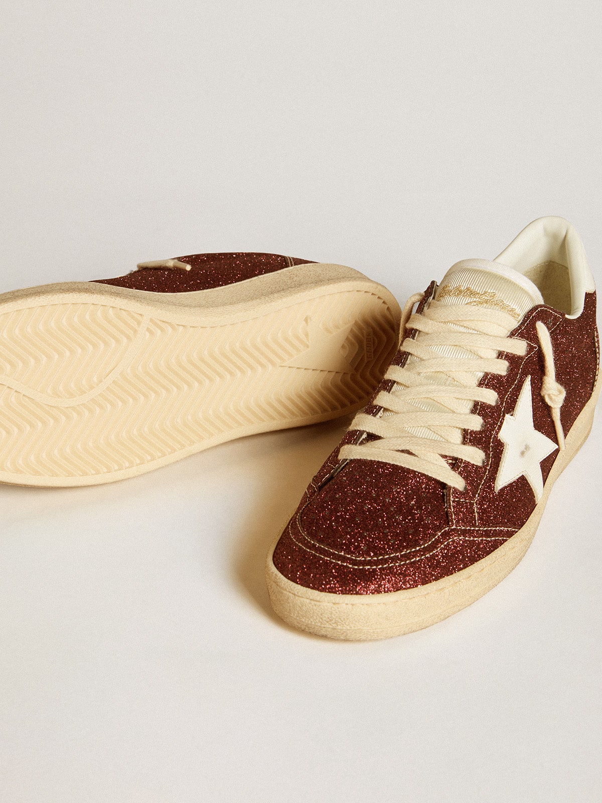 Ball Star in burgundy glitter with white leather star and heel tab| Golden Goose