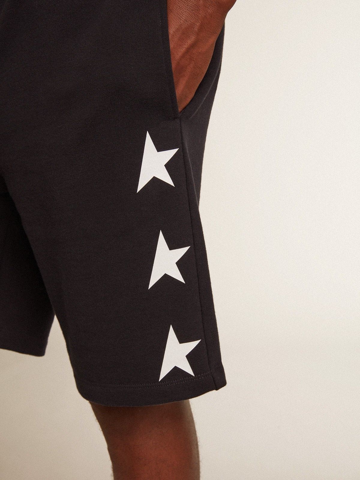 Men's black bermuda shorts with white stars| Golden Goose
