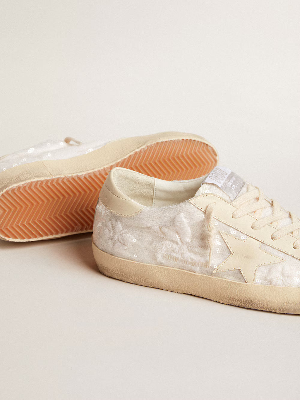Super-Star LTD in white sequins with leather star and embroidery| Golden Goose