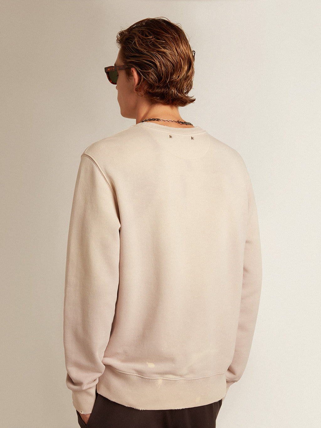 Distressed-finish pale pink sweatshirt| Golden Goose