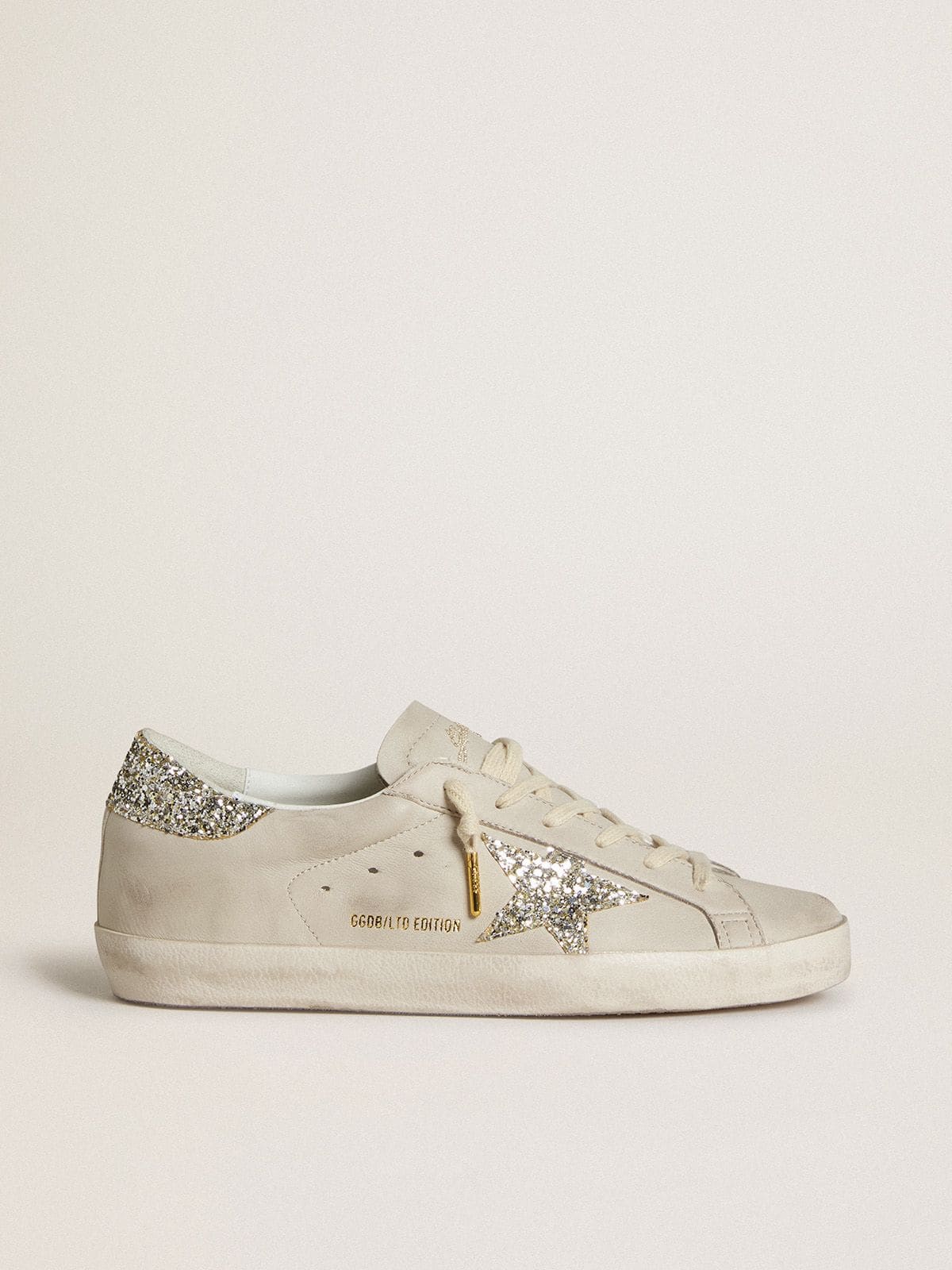 Women's Super-Star LTD in ivory nappa leather with platinum glitter star and heel tab| Golden Goose