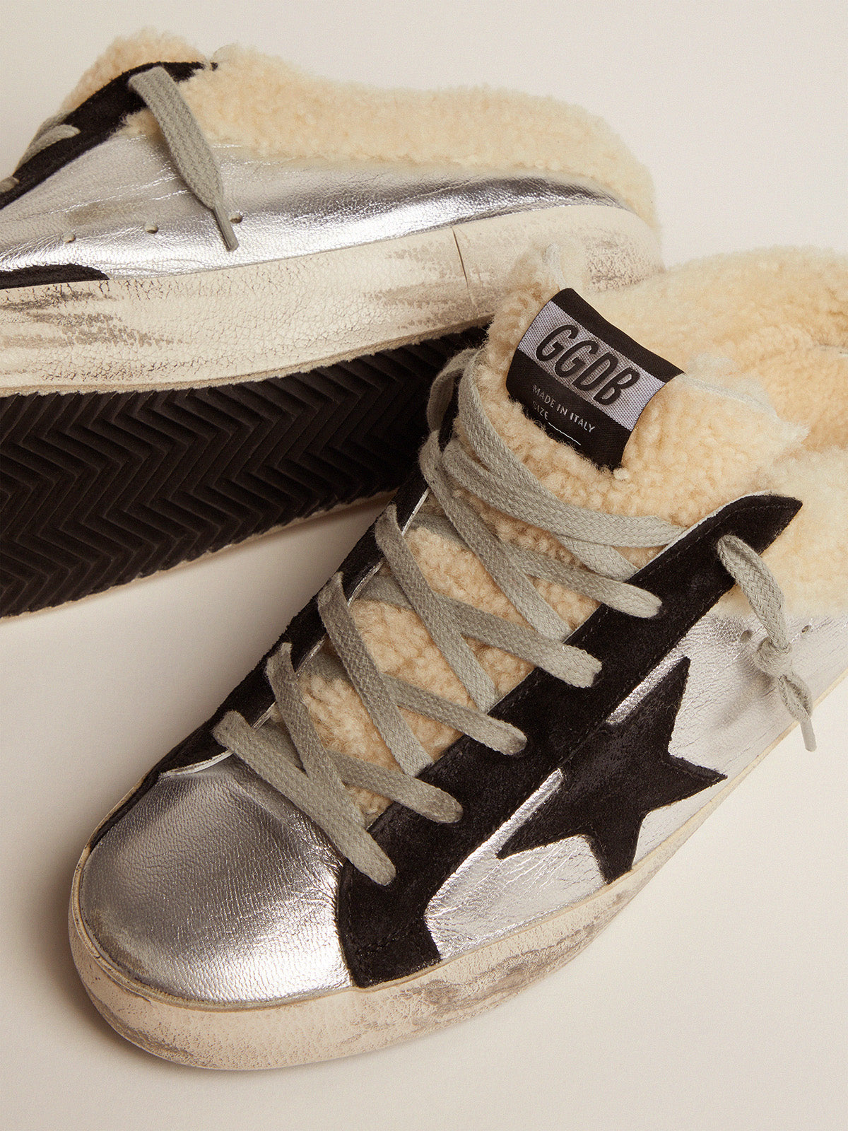 Women's Super-Star Sabot in silver laminated leather with black star| Golden Goose