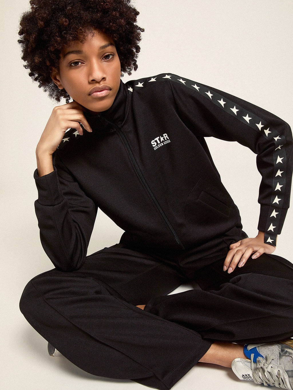 Women's black joggers with white stars on the sides| Golden Goose