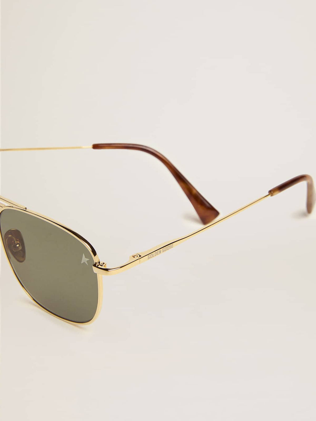 Aviator sunglasses with gold frame and green lenses| Golden Goose