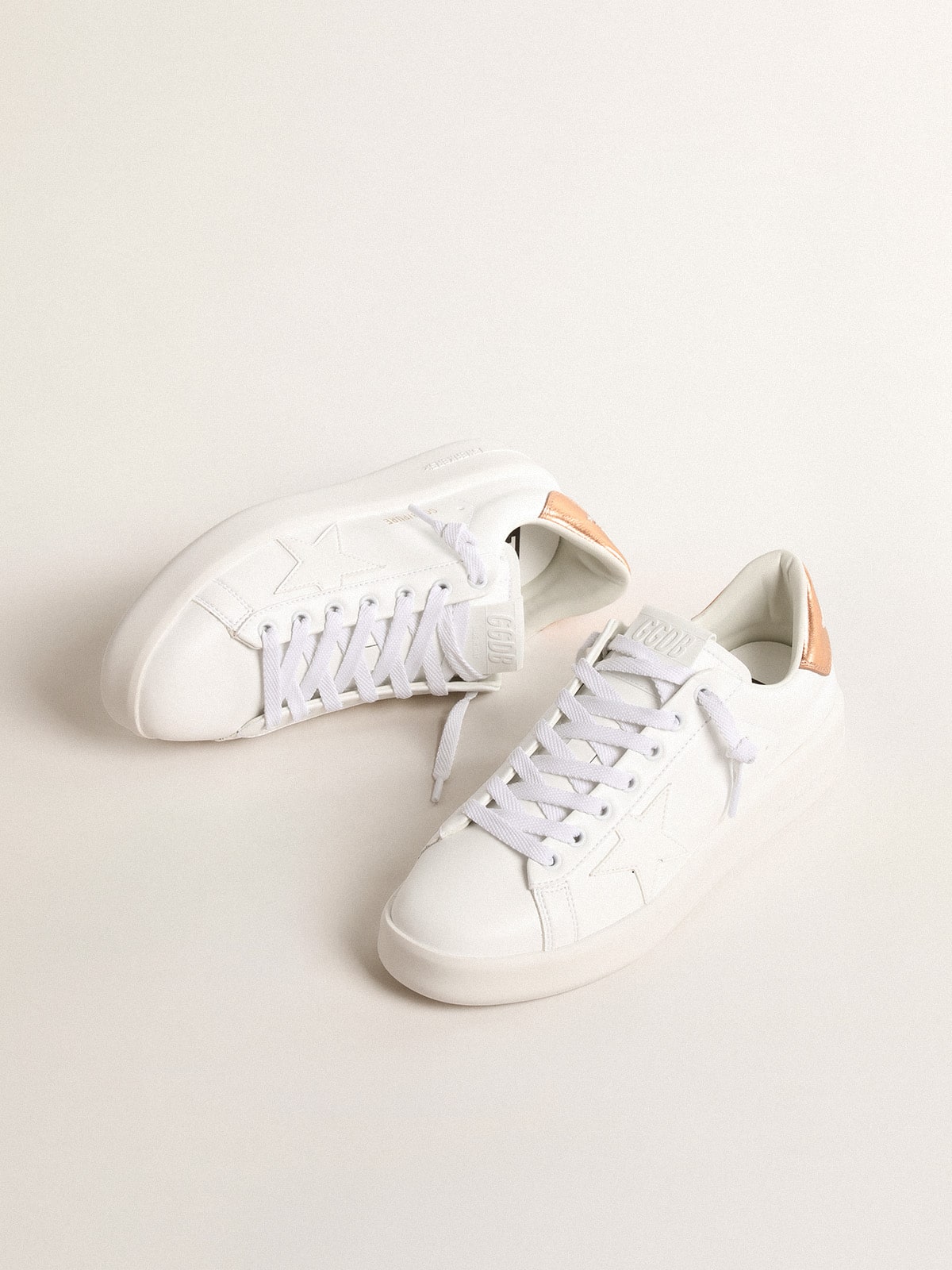 Women's bio-based Purestar with bronze metallic leather heel tab| Golden Goose