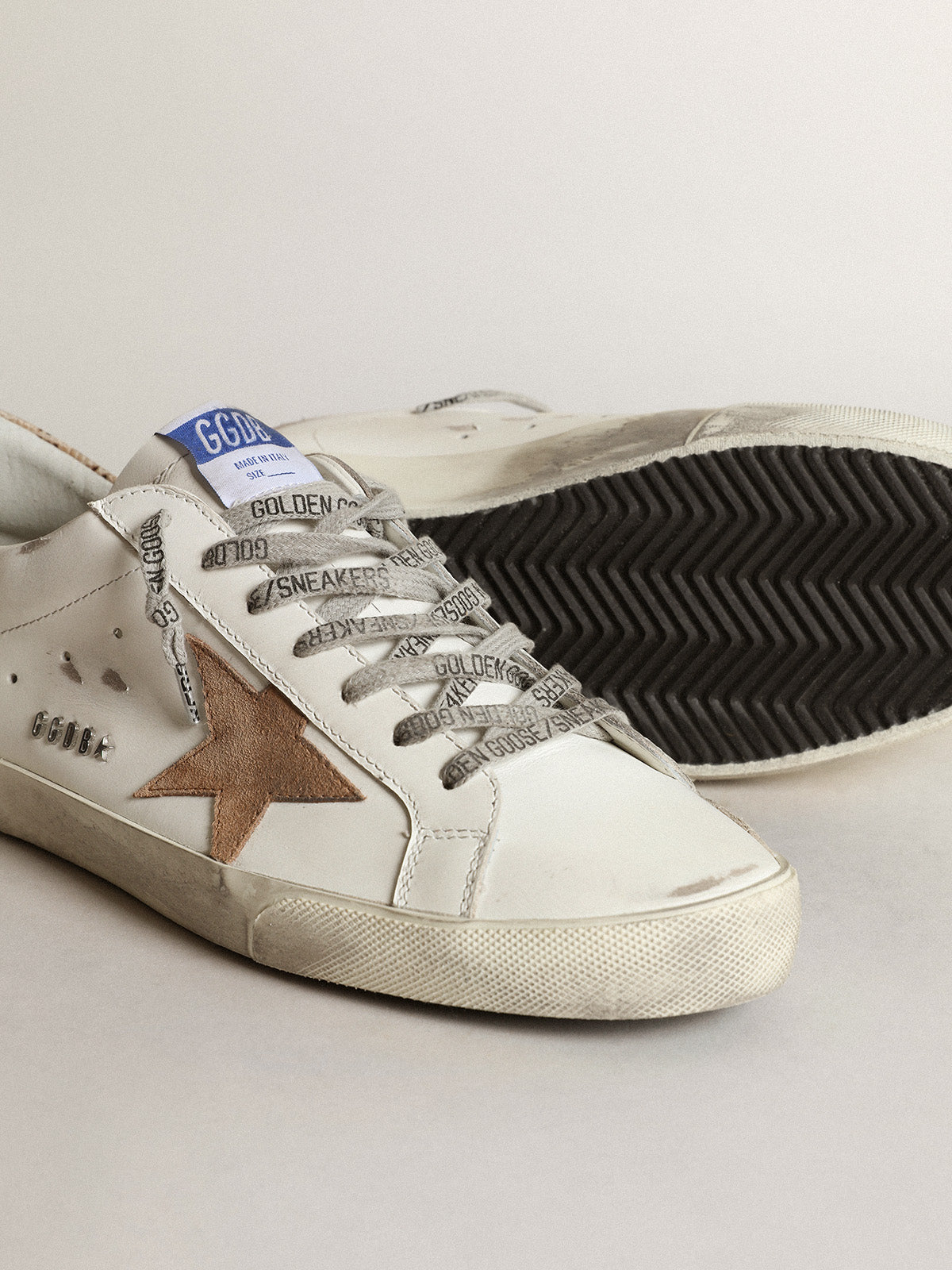 Super-Star with a tobacco suede star and beige heel tab| Golden Goose