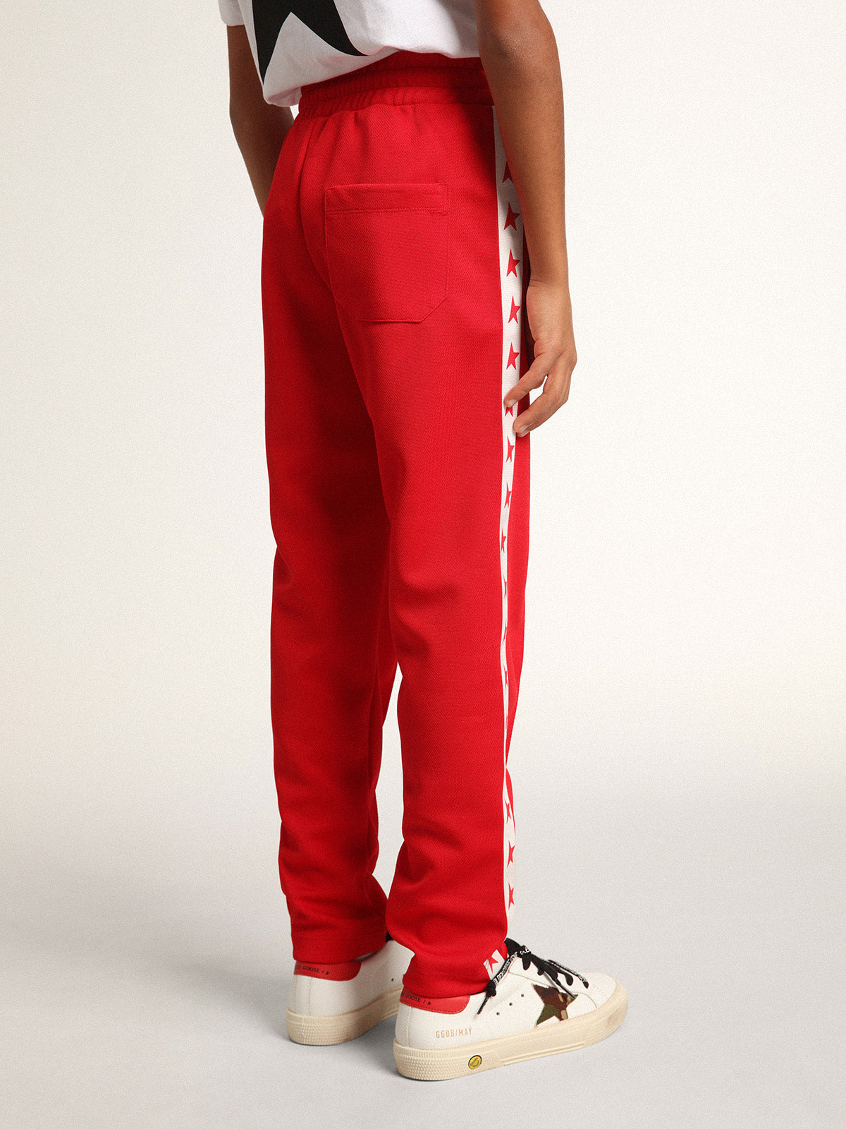 Red joggers with white stripe with contrasting red stars| Golden Goose