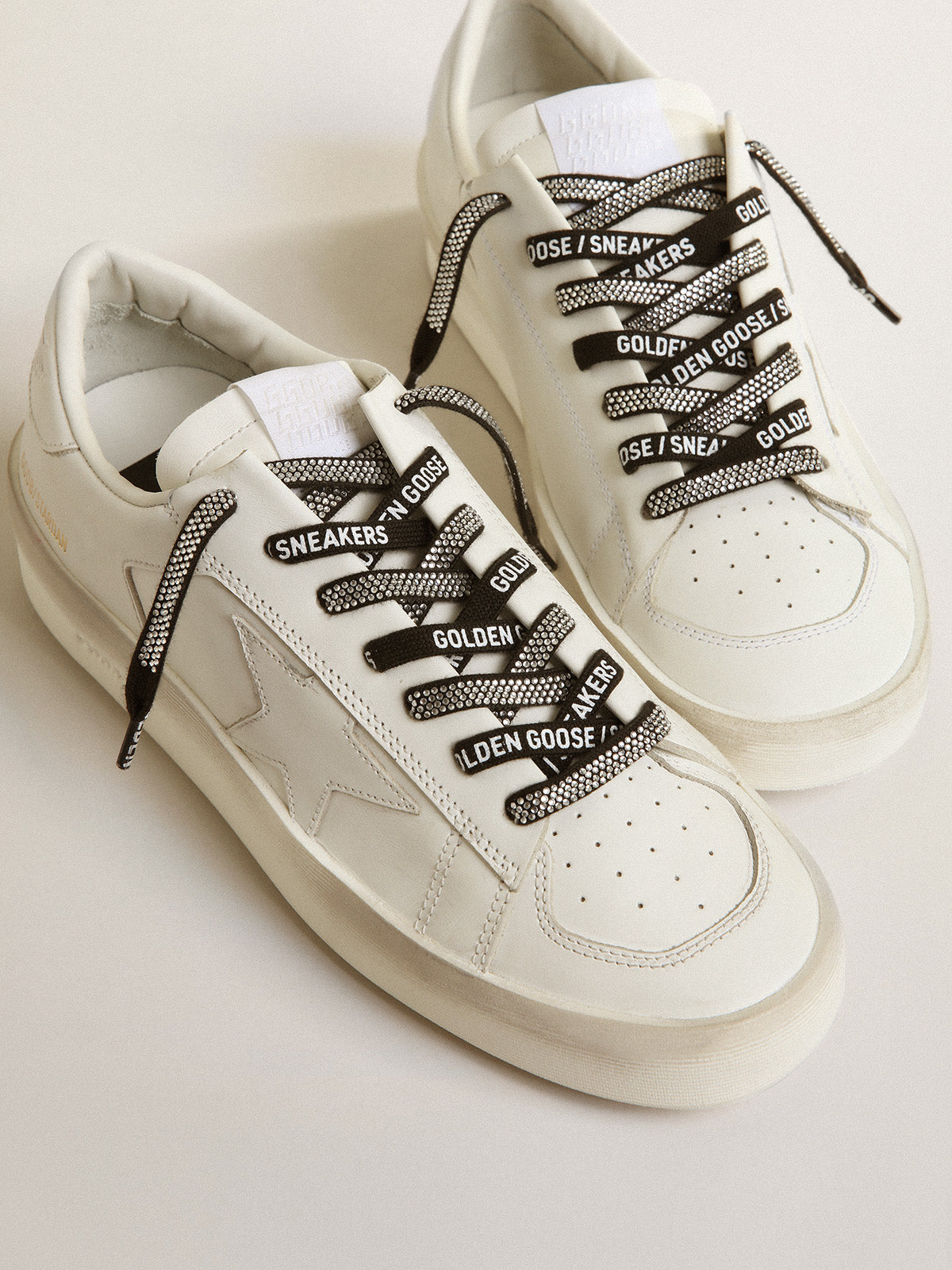Black laces with Swarovski rhinestones and contrasting white 'Golden Goose Sneakers' lettering| Golden Goose