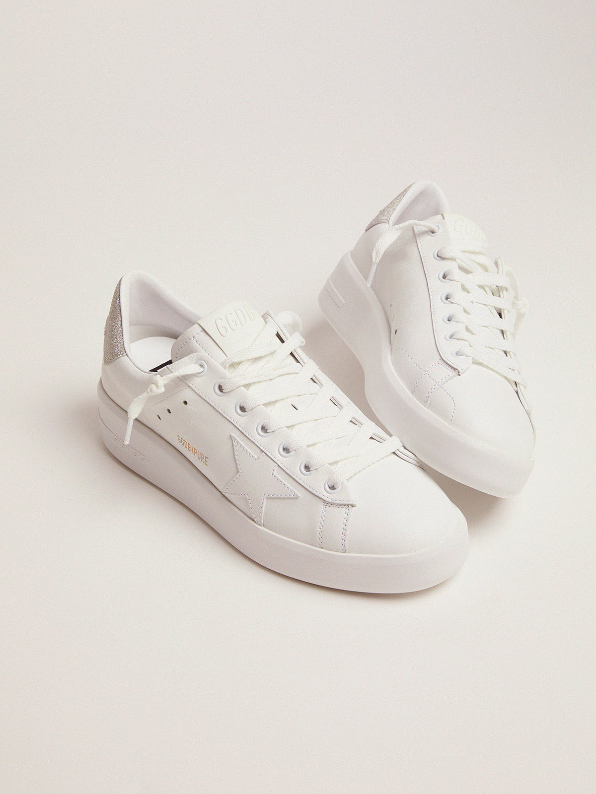 Purestar sneakers in white leather with champagne glitter heel tab| Golden Goose
