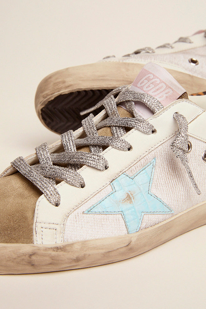 Super-Star in canvas and leather with light blue star and leopard heel tab| Golden Goose