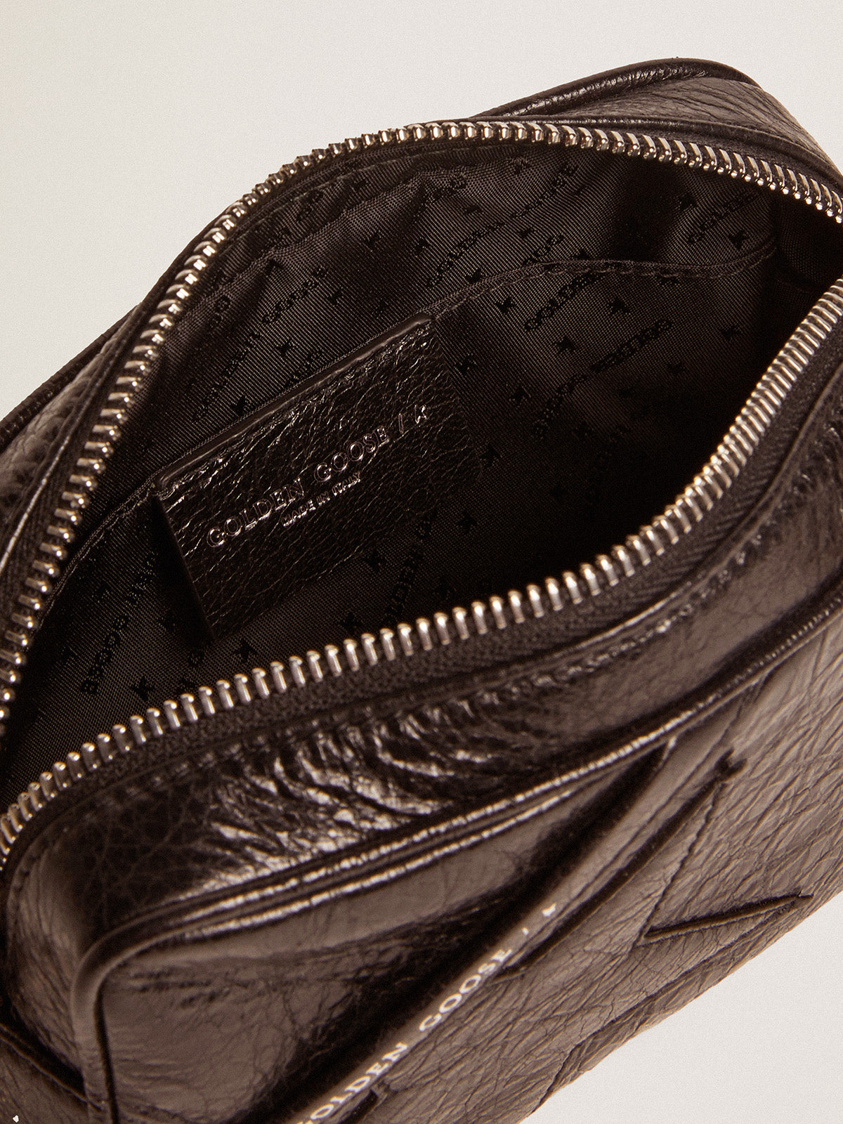 Women's Mini Star Bag in black glossy leather with tone-on-tone star| Golden Goose