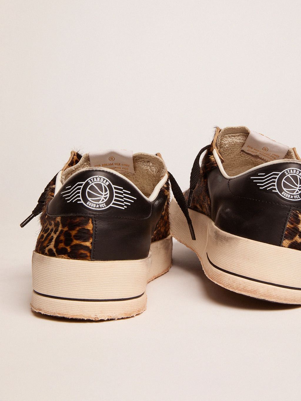 Stardan sneakers in leopard-print pony skin and black star| Golden Goose
