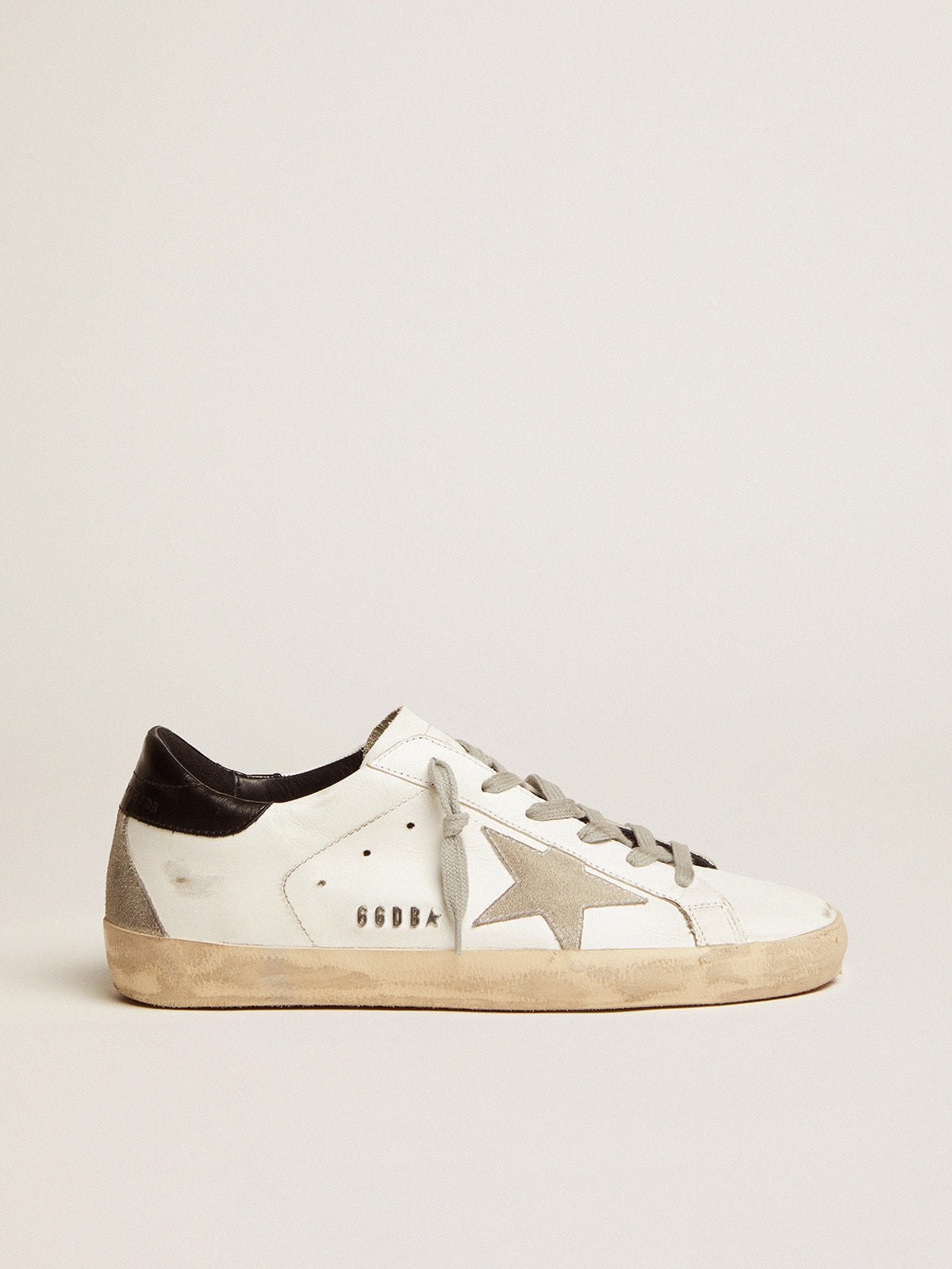 Women's Super-Star with black heel tab and metal stud lettering| Golden Goose