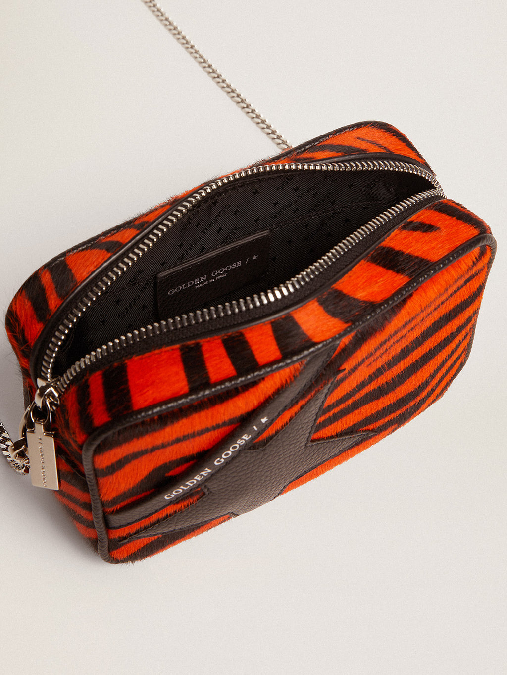 Women's Mini Star Bag in orange tiger print pony skin with black star| Golden Goose