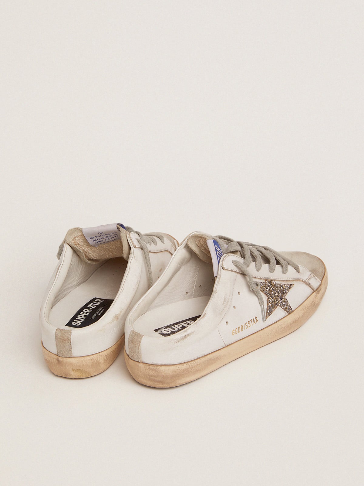 Super-Star Sabot with a platinum glitter star and suede tongue| Golden Goose
