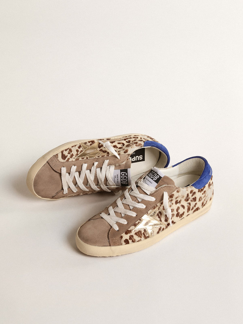 Super-Star LTD in pony skin with gold star and suede heel tab| Golden Goose
