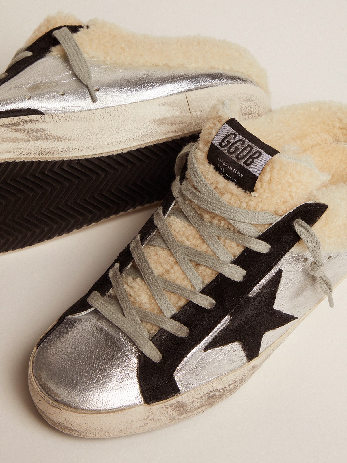 Women's Super-Star Sabot in silver laminated leather with black star| Golden Goose