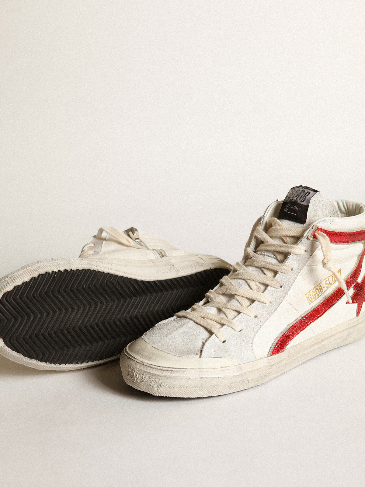 Slide with a red laminated leather star and flash| Golden Goose