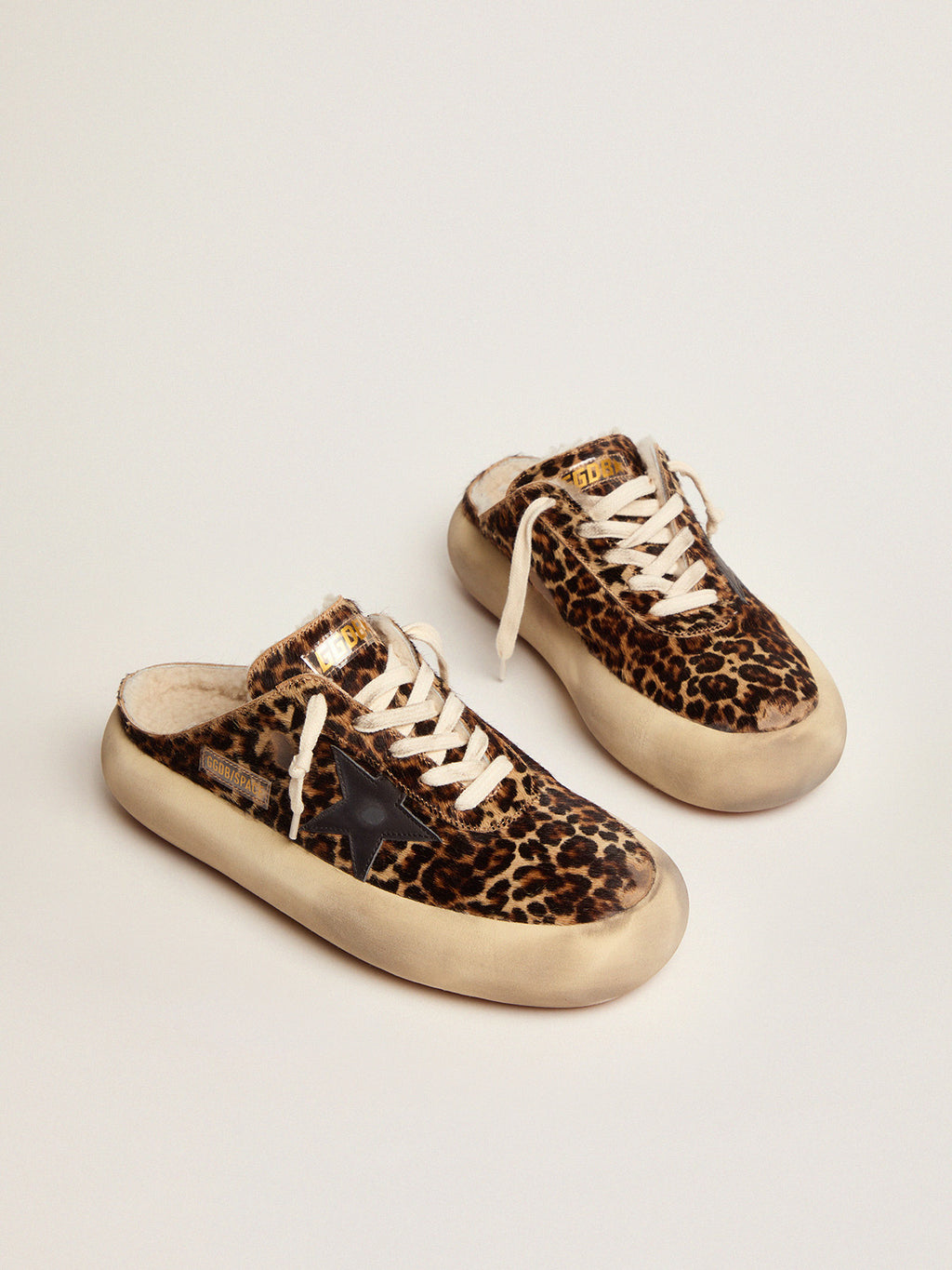 Women's Space-Star Sabot in animal print pony skin and shearling lining| Golden Goose