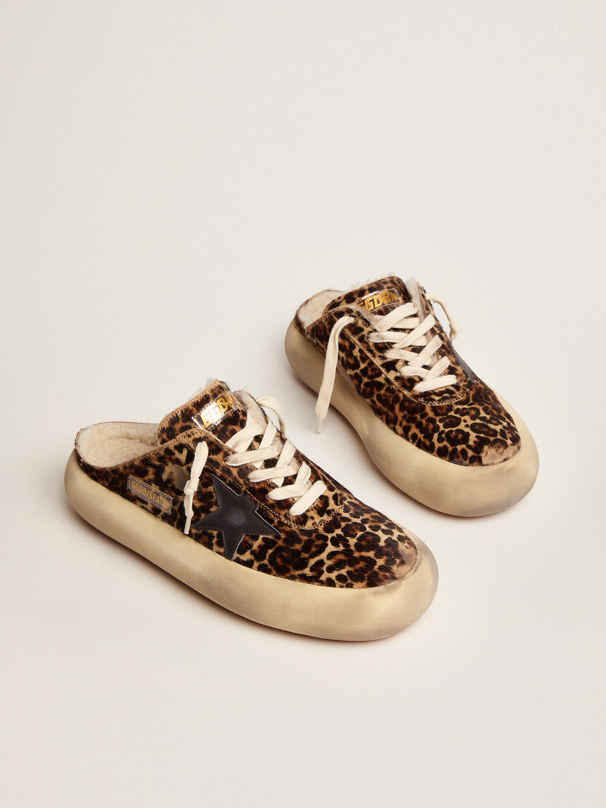 Women's Space-Star Sabot in animal print pony skin and shearling lining| Golden Goose