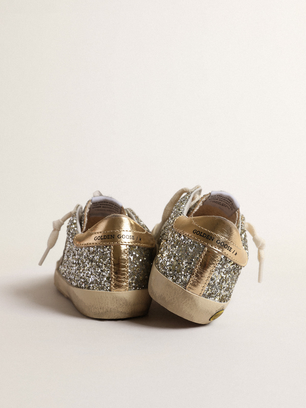 Super-Star Young in glitter with a suede star and gold heel tab| Golden Goose