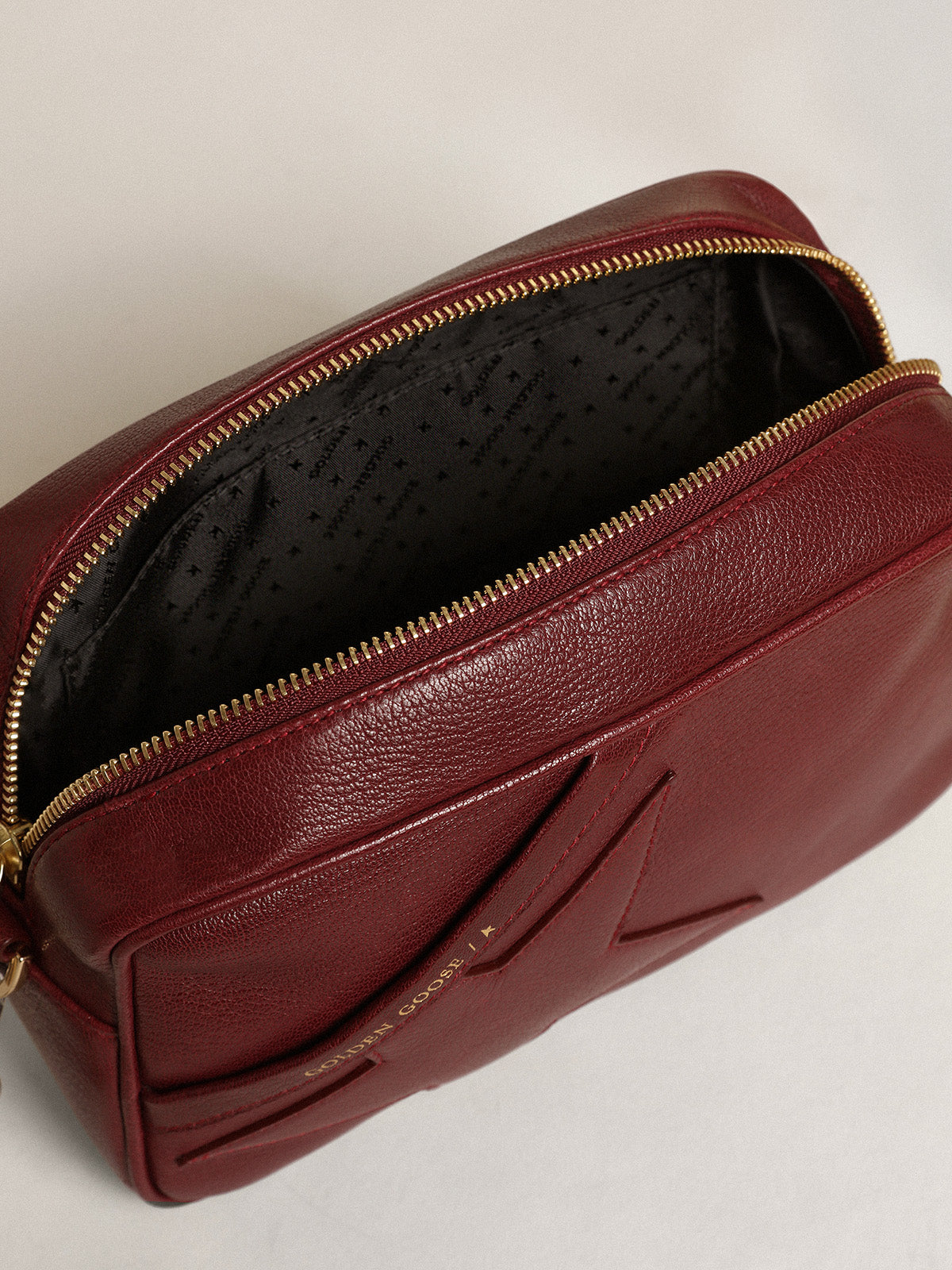 Women's Star Bag in burgundy leather with tone-on-tone star| Golden Goose