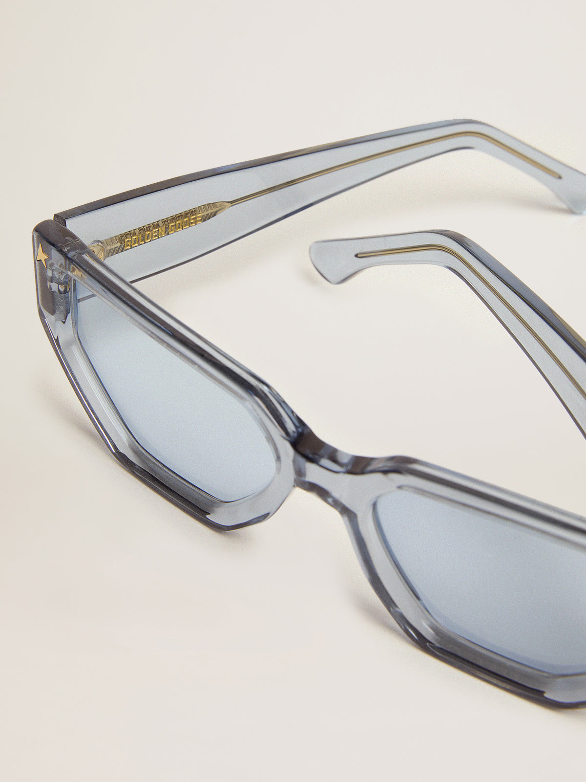 Rectangular-style Sunframe Jackie with clear baby blue frame| Golden Goose