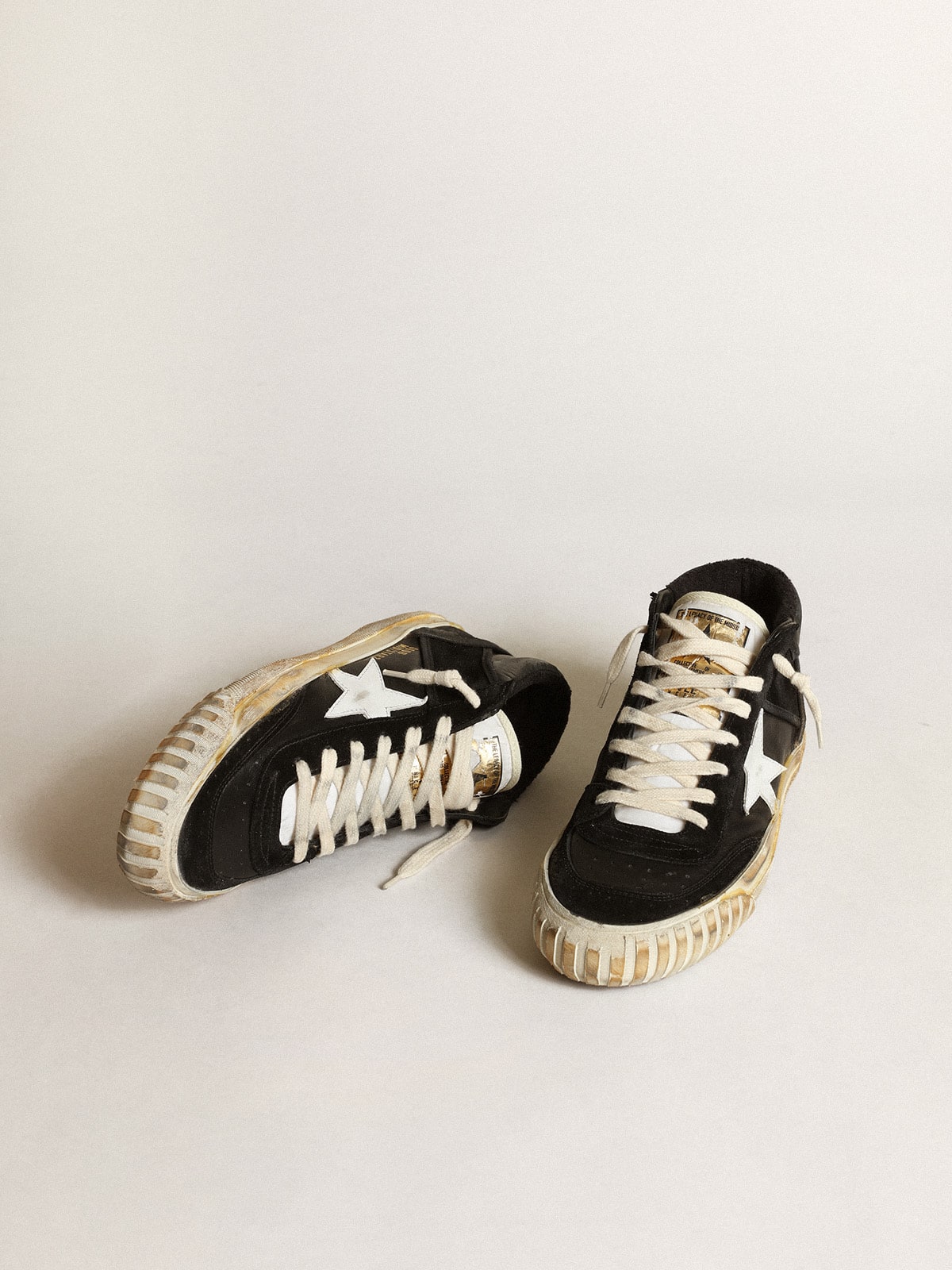 Women's Mid Star in black nappa and suede with white leather star| Golden Goose