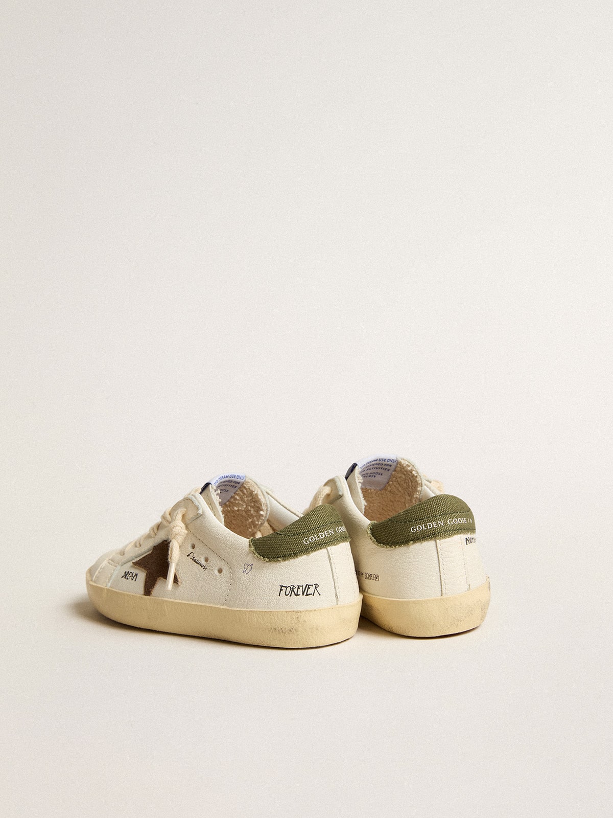 Super-Star Junior in nappa with suede star and green heel tab| Golden Goose