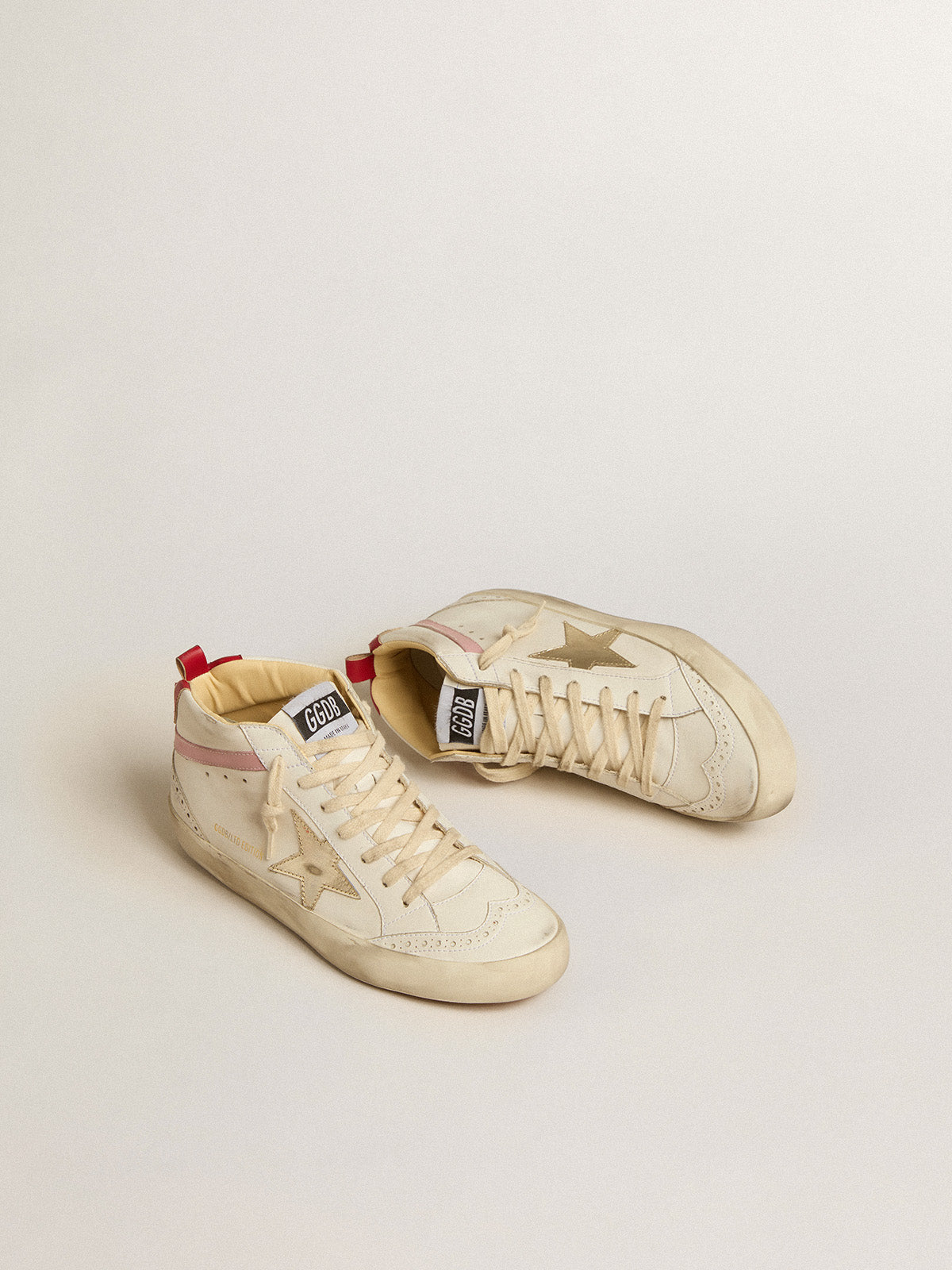 Bio-based Mid Star LTD with gold leather star and pink flash| Golden Goose