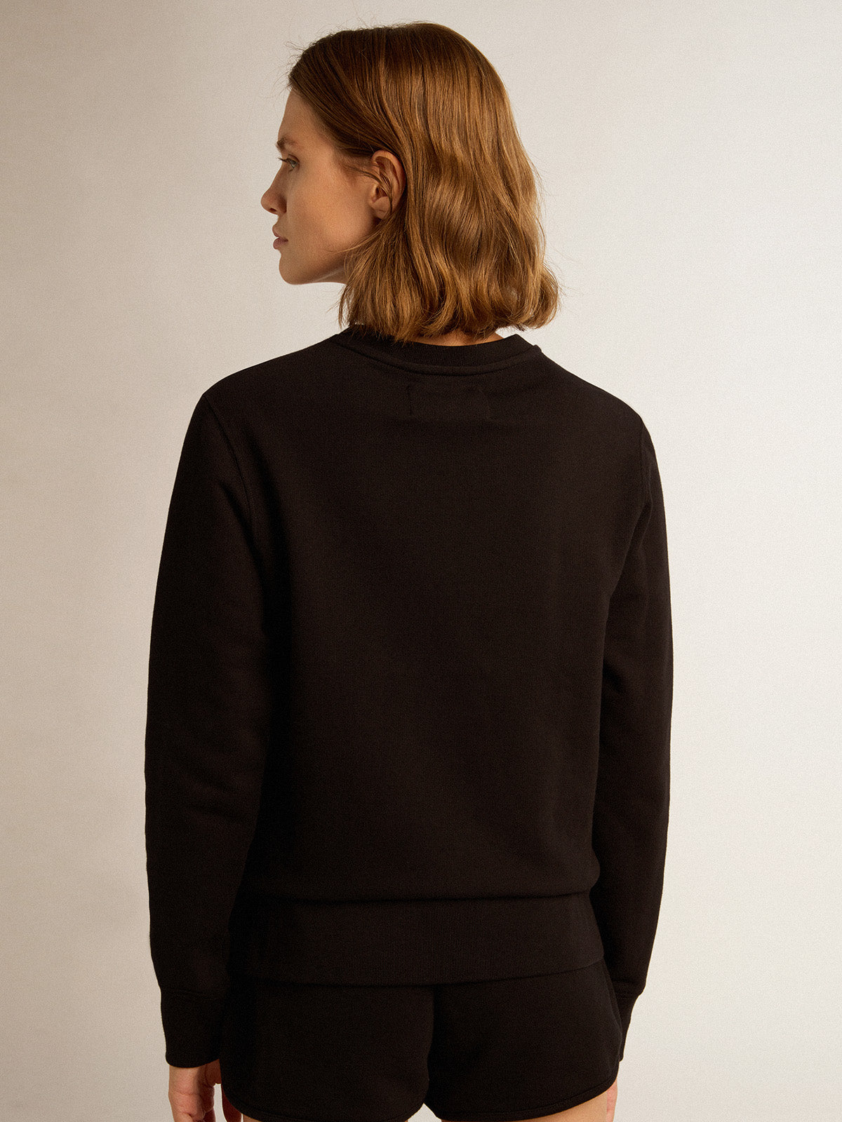 Black Athena Star Collection sweatshirt with tone-on-tone star on the front| Golden Goose