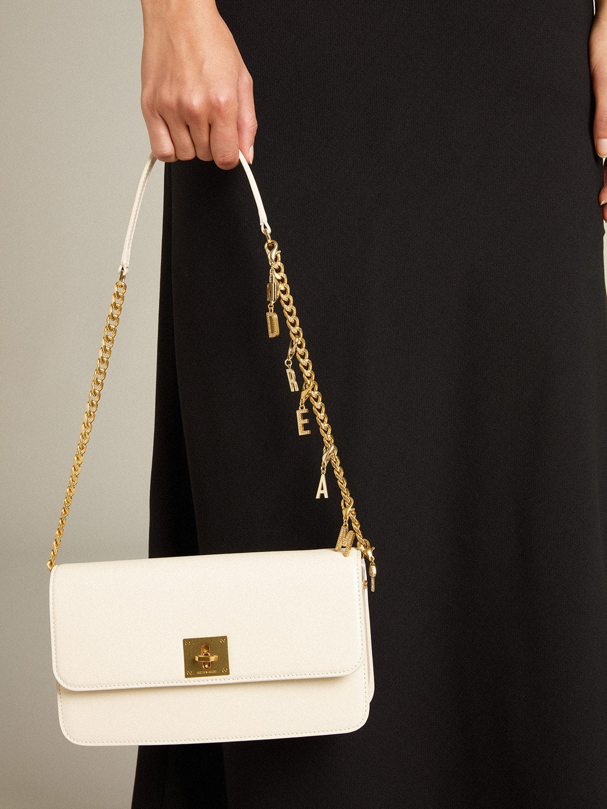 Gioia Bag in butter-colored boarded leather with gold details| Golden Goose