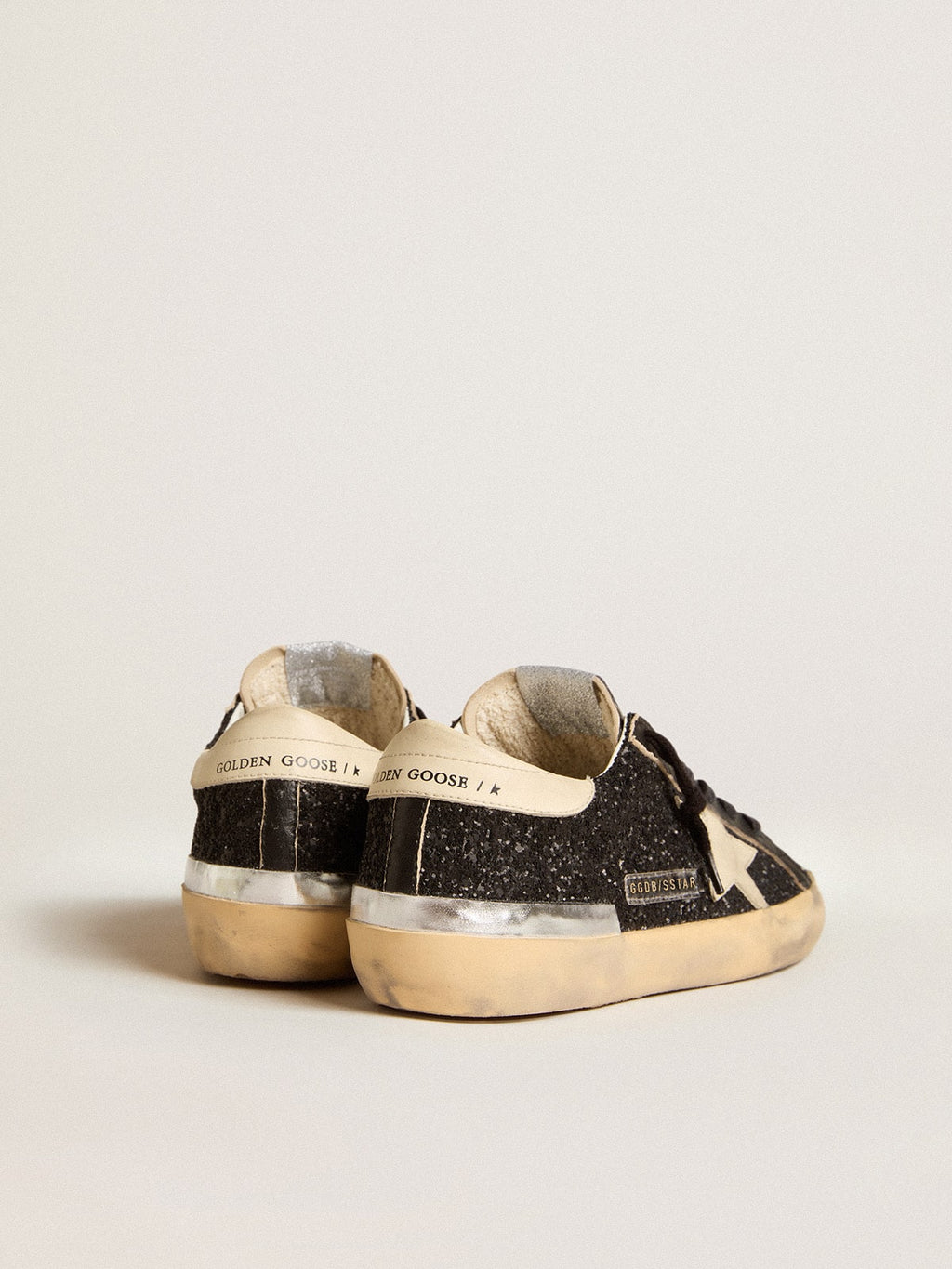 Super-Star in black glitter and nappa with cream leather star and heel tab| Golden Goose