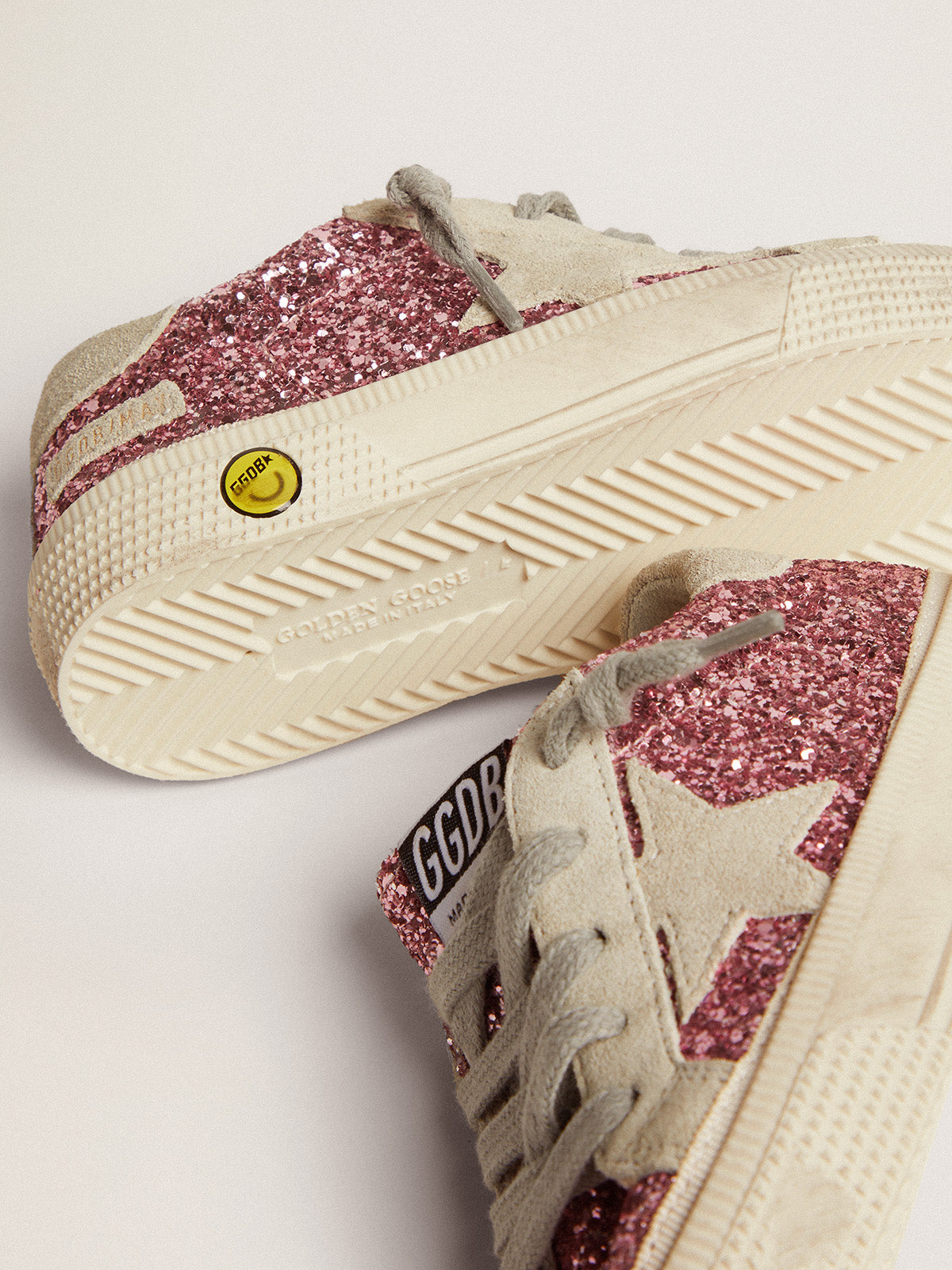 May sneakers in pink glitter with star and heel tab in ice-gray suede| Golden Goose