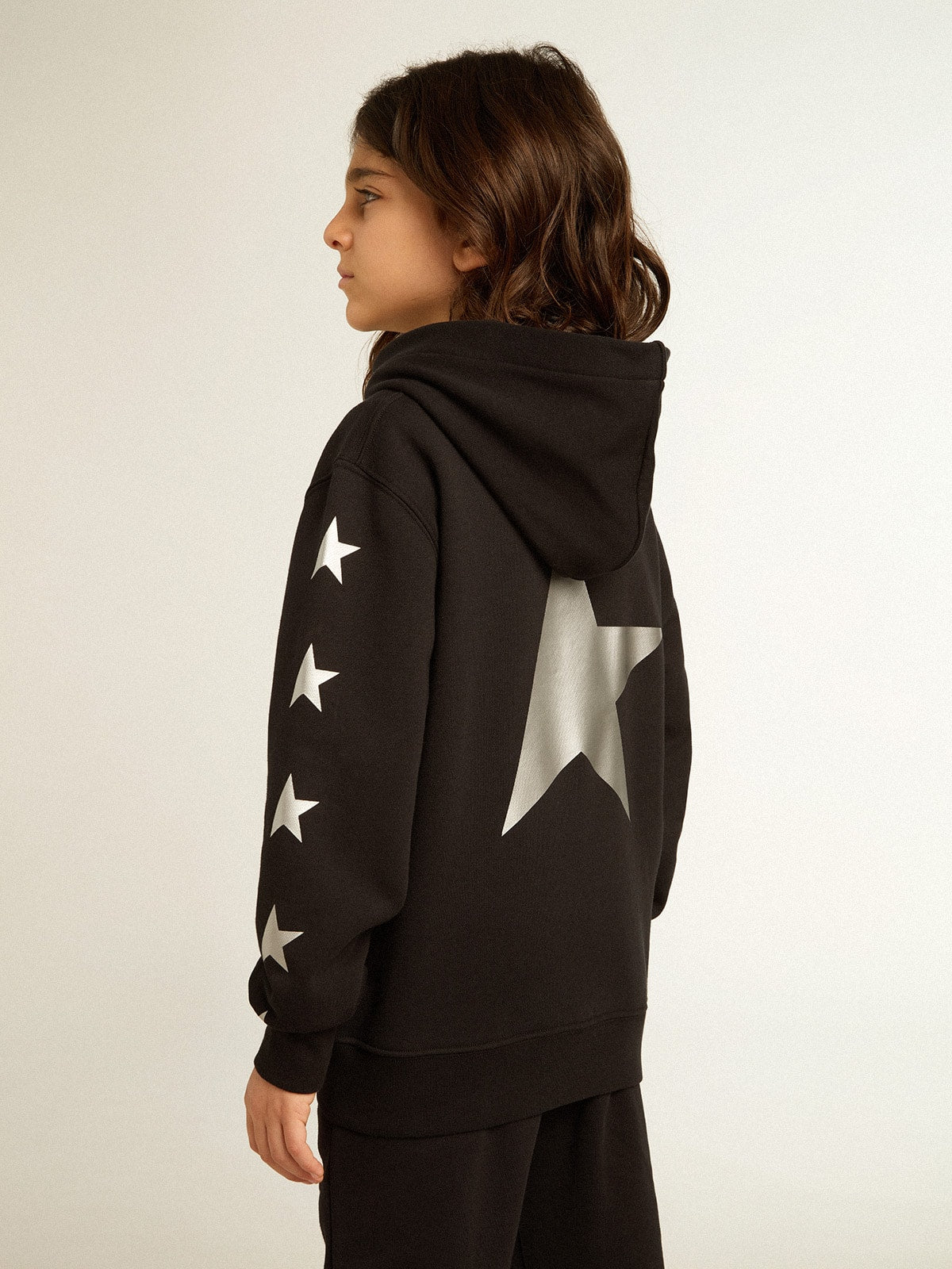 Boys' hooded sweatshirt in black with contrasting silver stars| Golden Goose