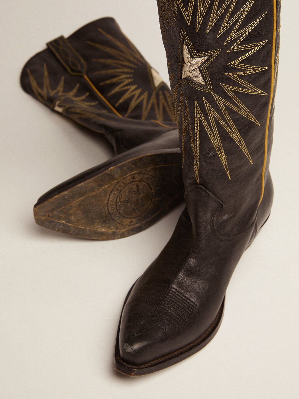 Wish Star boots in black leather with platinum laminated leather inlay star| Golden Goose
