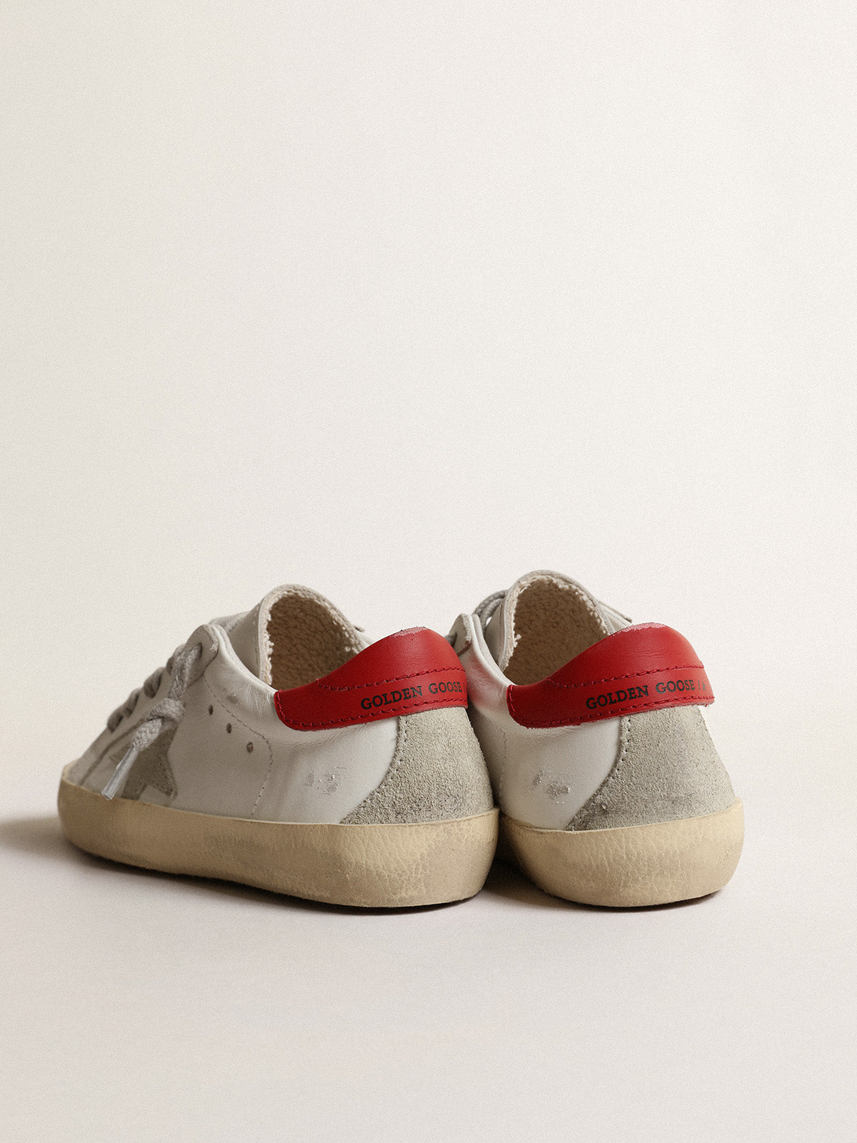 Super-Star Young with suede star and red leather heel tab| Golden Goose
