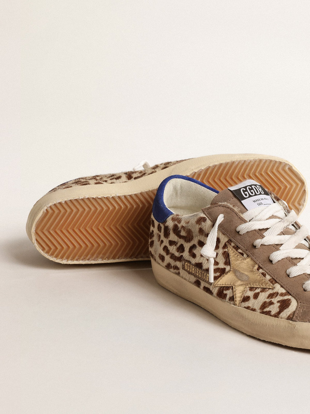 Super-Star LTD in pony skin with gold star and suede heel tab| Golden Goose
